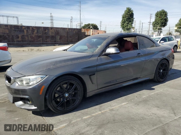 2014 BMW 4 Series 428i with VIN WBA3V7C55EP770804, listed as a Copart auction lot 79122804 with 98,890 mi miles and Salvage Title. Bid and sale history available at DreamBid. Image 1.