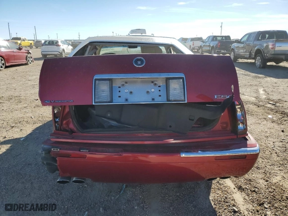 2000 Cadillac Eldorado with VIN 1G6EL12Y2YU147272, listed as a Copart auction lot 84150944 with 0 mi miles and Salvage Title. Bid and sale history available at carsss.com. Image 6.