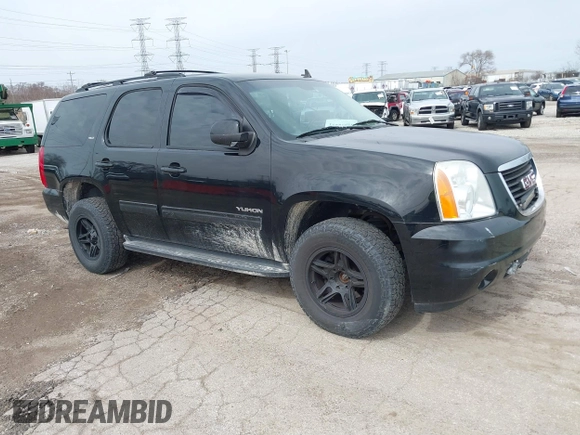 2013 GMC Yukon SLT with VIN 1GKS2CE01DR135135, listed as a IAAI auction lot 41828474 with 180,347 mi miles. Bid and sale history available at carsss.com. Image 1.