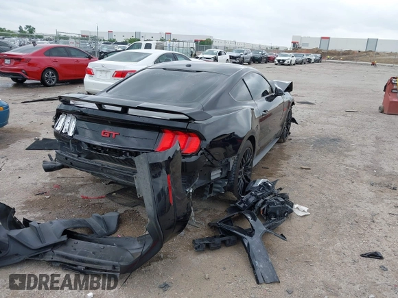 2020 Ford Mustang GT with VIN 1FA6P8CF8L5124454, listed as a IAAI auction lot 42133227 with 59,366 mi miles and . Bid and sale history available at DreamBid. Image 4.