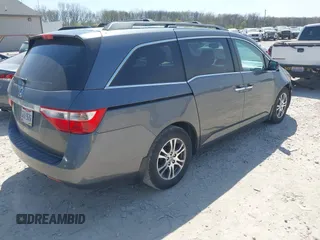 2012 Honda Odyssey EX-L with VIN 5FNRL5H69CB047425, listed as a IAAI auction lot 42064979 with 242,409 mi miles and . Bid and sale history available at carsss.com. Image 4.