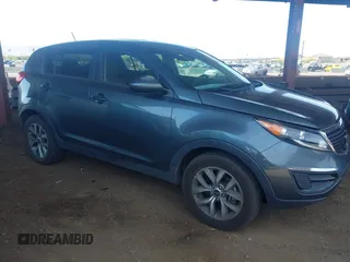 2014 Kia Sportage LX with VIN KNDPB3ACXE7588801, listed as a IAAI auction lot 42180018 with 192,062 mi miles and . Bid and sale history available at carsss.com. Image 1.