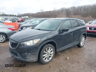 2014 Mazda CX-5 Grand Touring with VIN JM3KE4DY5E0373731, listed as a IAAI auction lot 41517852 with 148,414 mi miles. Bid and sale history available at carsss.com. Image 17.