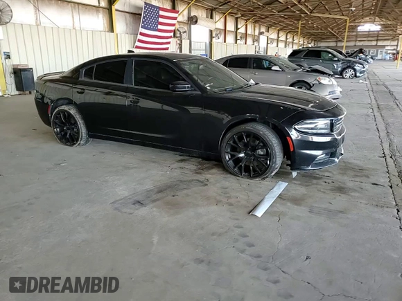 2015 Dodge Charger SXT with VIN 2C3CDXJG9FH748809, listed as a Copart auction lot 61682335 with 128,252 mi miles and Salvage title. Bid and sale history available at DreamBid. Image 13.