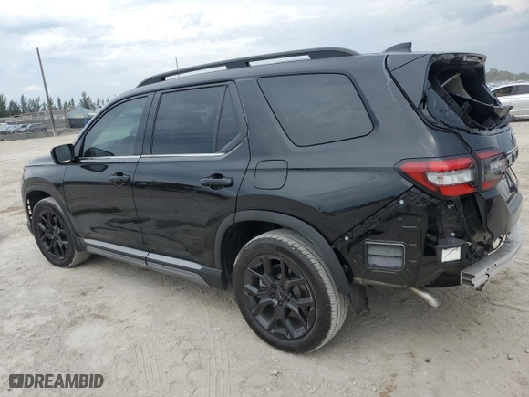 2025 Honda Pilot Touring with VIN 5FNYG2H79SB007996, listed as a Copart auction lot 49767095 with 15,894 mi miles and Salvage Title. Bid and sale history available at carsss.com. Image 2.