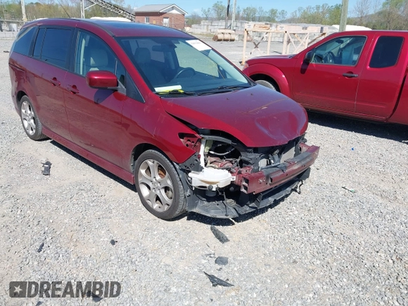 2010 Mazda 5 Sport with VIN JM1CR2WL6A0389227, listed as a IAAI auction lot 42031801 with 100,652 mi miles. Bid and sale history available at carsss.com. Image 1.