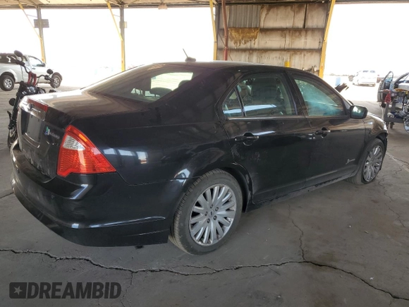 2012 Ford Fusion Hybrid с VIN 3FADP0L34CR416775, выставлен на аукционе Copart как лот 55108645 с пробегом 102 574 миль миль и Списание • Salvage title. История ставок и продаж доступна на DreamBid. Изображение 3.