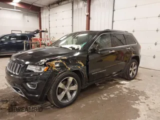 2015 Jeep Grand Cherokee Overland with VIN 1C4RJFCT7FC612930, listed as a IAAI auction lot 41485240 with 189,564 mi miles. Bid and sale history available at carsss.com. Image 2.