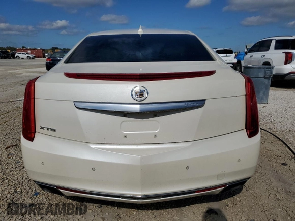 2013 Cadillac XTS Premium z VIN 2G61S5S32D9153013, wystawiony jako Copart lot #80877424 z przebiegiem Nie podano mil oraz Nie do naprawy. Historia ofert i sprzedaży dostępna na DreamBid. Obrazek 6.