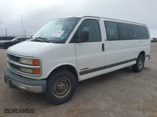 2000 Chevrolet Express Van with VIN 1GAHG39R0Y1233974, listed as a IAAI auction lot 41729422 with 132,827 mi miles. Bid and sale history available at carsss.com. Image 2.