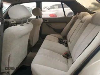 1995 Toyota Camry LE z VIN 4T1SK12EXSU529058, wystawiony jako Copart lot #49055255 z przebiegiem 166 029 mil mil oraz Szkoda całkowita • Salvage title. Historia ofert i sprzedaży dostępna na DreamBid. Obrazek 10.