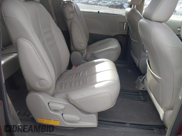 2014 Toyota Sienna XLE with VIN 5TDYK3DCXES471676, listed as a IAAI auction lot 41853038 with 169,790 mi miles. Bid and sale history available at carsss.com. Image 8.