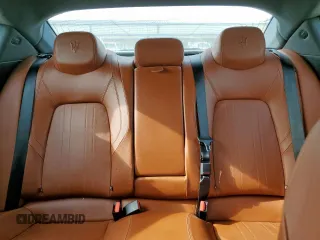 2017 Maserati Ghibli z VIN ZAM57XSA9H1206127, wystawiony jako Copart lot #56883775 z przebiegiem 13 439 mil mil oraz Czysty tytuł • Clean title. Historia ofert i sprzedaży dostępna na DreamBid. Obrazek 10.