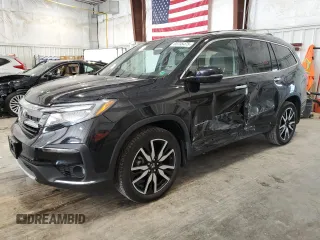 2020 Honda Pilot Touring 8-Passenger with VIN 5FNYF6H9XLB020205, listed as a Copart auction lot 65735475 with 112,858 mi miles and Salvage title. Bid and sale history available at DreamBid. Image 1.