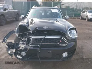 2019 MINI Countryman Cooper S z VIN WMZYT5C59K3G92620, wystawiony jako IAAI lot #41481981 z przebiegiem 51 904 mil mil oraz . Historia ofert i sprzedaży dostępna na DreamBid. Obrazek 12.