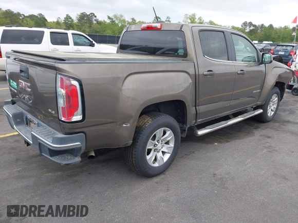2015 GMC Canyon 2WD SLE with VIN 1GTG5BE38F1229799, listed as a IAAI auction lot 41944801 with 71,165 mi miles. Bid and sale history available at carsss.com. Image 4.