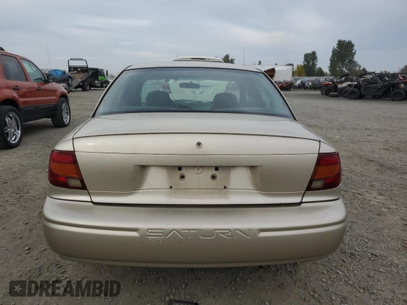 2001 Saturn SL z VIN 1G8ZH52831Z348124, wystawiony jako Copart lot #76058854 z przebiegiem 191 465 mil mil oraz Szkoda całkowita • Salvage title. Historia ofert i sprzedaży dostępna na DreamBid. Obrazek 6.