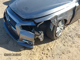 2015 Infiniti Q50 Premium with VIN JN1BV7AP3FM358244, listed as a IAAI auction lot 42063278 with 98,873 mi miles and . Bid and sale history available at DreamBid. Image 6.