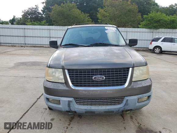 2004 Ford Expedition Special Service with VIN 1FMFU16L54LA95354, listed as a Copart auction lot 57027115 with 176,243 mi miles and Salvage title. Bid and sale history available at DreamBid. Image 5.