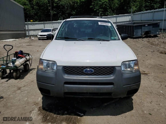 2003 Ford Escape XLS Popular with VIN 1FMYU92163KC43110, listed as a Copart auction lot 58699684 with 66,450 mi miles and Salvage Title. Bid and sale history available at carsss.com. Image 5.