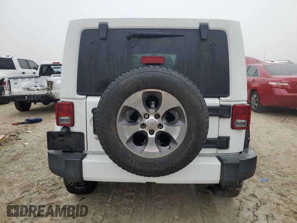 2016 Jeep Wrangler Unlimited 75th Anniversary with VIN 1C4BJWEG8GL143348, listed as a Copart auction lot 44254585 with 111,616 mi miles and Salvage Title. Bid and sale history available at carsss.com. Image 6.