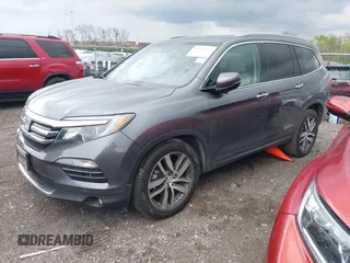 2016 Honda Pilot Touring with VIN 5FNYF6H93GB003106, listed as a IAAI auction lot 41989772 with 110,123 mi miles. Bid and sale history available at carsss.com. Image 17.
