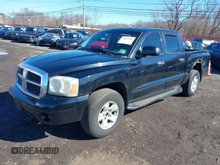 2005 Dodge Dakota SLT z VIN 1D7HW48N25S178373, wystawiony jako IAAI lot #41815561 z przebiegiem 148 112 mil mil oraz . Historia ofert i sprzedaży dostępna na DreamBid. Obrazek 19.