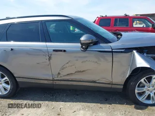 2020 Land Rover Range Rover Velar S z VIN SALYB2EX7LA259607, wystawiony jako IAAI lot #40980294 z przebiegiem 95 967 mil mil oraz . Historia ofert i sprzedaży dostępna na DreamBid. Obrazek 13.