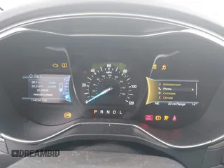 2016 Ford Fusion Energi SE Luxury with VIN 3FA6P0PU9GR357076, listed as a IAAI auction lot 42081615 with 174,234 mi miles. Bid and sale history available at carsss.com. Image 7.
