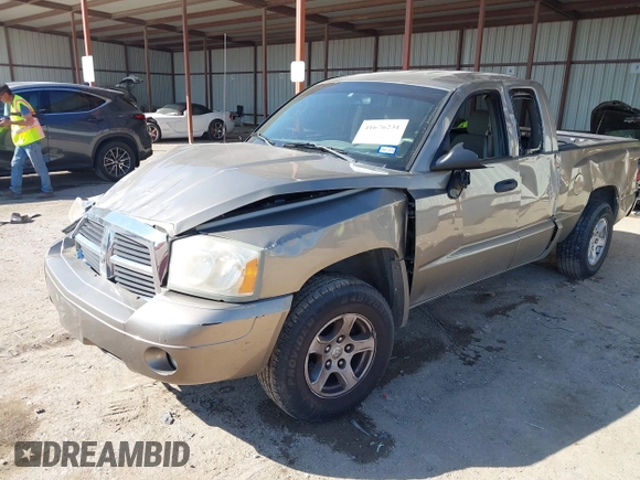 2006 Dodge Dakota SLT with VIN 1D7HE42K16S666071, listed as a IAAI auction lot 41676231 with 129,977 mi miles and . Bid and sale history available at carsss.com. Image 17.