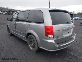 2014 Dodge Grand Caravan SE with VIN 2C4RDGBGXER106984, listed as a IAAI auction lot 41815414 with 170,984 mi miles. Bid and sale history available at carsss.com. Image 3.