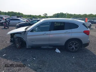 2018 BMW X1 xDrive28i with VIN WBXHT3C32J5K23486, listed as a IAAI auction lot 42387208 with 76,115 mi miles and . Bid and sale history available at DreamBid. Image 15.