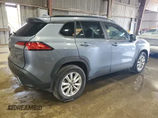 2023 Toyota Corolla Cross LE z VIN 7MUBAAAG4PV042580, wystawiony jako Copart lot #60788025 z przebiegiem 59 576 mil mil oraz Szkoda całkowita • Salvage title. Historia ofert i sprzedaży dostępna na DreamBid. Obrazek 3.