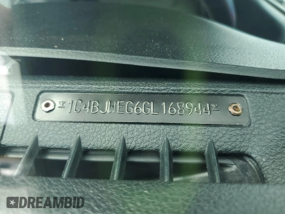 2016 Jeep Wrangler Unlimited Sahara with VIN 1C4BJWEG6GL168944, listed as a Copart auction lot 61650615 with 66,016 mi miles and Salvage title. Bid and sale history available at DreamBid. Image 12.