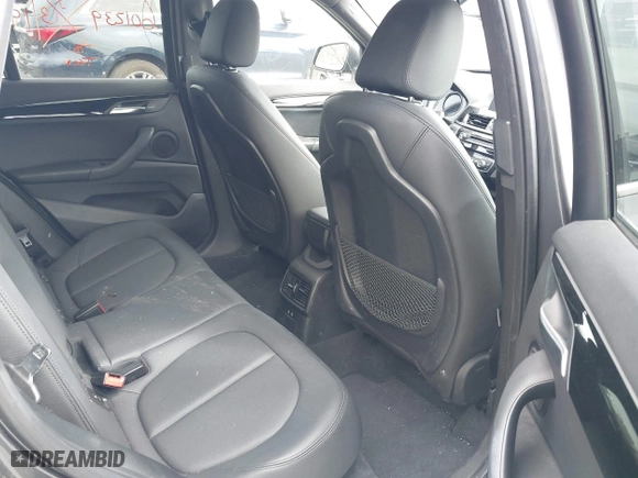2019 BMW X1 xDrive28i with VIN WBXHT3C51K5L90571, listed as a IAAI auction lot 41909209 with 35,902 mi miles. Bid and sale history available at carsss.com. Image 8.