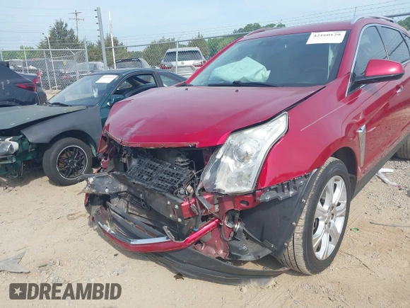 2015 Cadillac SRX Performance Collection z VIN 3GYFNCE37FS567267, wystawiony jako IAAI lot #42160129 z przebiegiem 144 948 mil mil oraz . Historia ofert i sprzedaży dostępna na DreamBid. Obrazek 6.