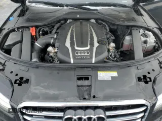 2017 Audi A8 Sport z VIN WAU43AFD2HN003499, wystawiony jako Copart lot #88994855 z przebiegiem 93 734 mil mil oraz Szkoda całkowita • Salvage title. Historia ofert i sprzedaży dostępna na DreamBid. Obrazek 11.