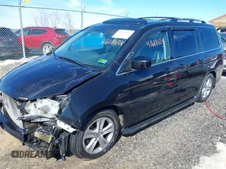 2008 Honda Odyssey Touring with VIN 5FNRL38948B029193, listed as a IAAI auction lot 41618424 with 219,964 mi miles. Bid and sale history available at carsss.com. Image 2.