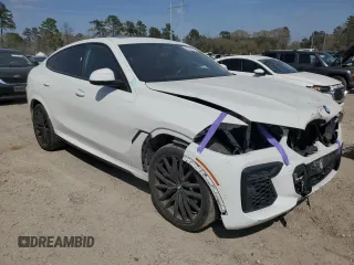 2022 BMW X6 xDrive40i z VIN 5UXCY6C0XN9K78927, wystawiony jako Copart lot #48348335 z przebiegiem 63 074 mil mil oraz Szkoda całkowita • Salvage title. Historia ofert i sprzedaży dostępna na DreamBid. Obrazek 4.