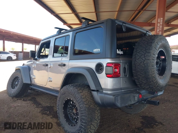 2019 Jeep Wrangler Unlimited Sport S z VIN 1C4HJXDG7KW557682, wystawiony jako IAAI lot #42586742 z przebiegiem 49 741 mil mil oraz . Historia ofert i sprzedaży dostępna na DreamBid. Obrazek 3.