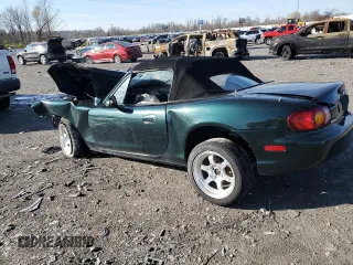 1999 Mazda MX-5 Miata z VIN JM1NB3536X0133733, wystawiony jako Copart lot #50906215 z przebiegiem Nie podano mil oraz Szkoda całkowita • Salvage title. Historia ofert i sprzedaży dostępna na DreamBid. Obrazek 2.