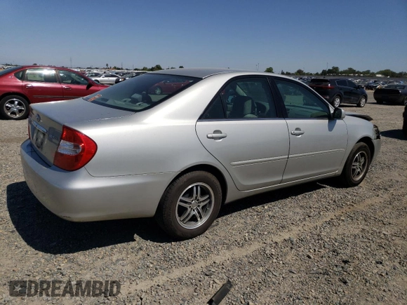 2002 Toyota Camry LE z VIN 4T1BE32KX2U037722, wystawiony jako Copart lot #58482805 z przebiegiem 154 207 mil mil oraz Szkoda całkowita • Salvage title. Historia ofert i sprzedaży dostępna na DreamBid. Obrazek 3.