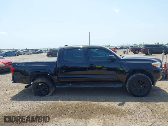 2018 Toyota Tacoma SR with VIN 5TFAX5GN5JX126118, listed as a IAAI auction lot 41949791 with 37,615 mi miles and . Bid and sale history available at DreamBid. Image 13.