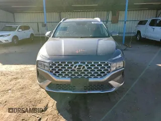 2021 Hyundai Santa Fe Hybrid Blue with VIN KM8S2DA1XMU011812, listed as a Copart auction lot 76833204 with 64,764 mi miles and Salvage Title. Bid and sale history available at carsss.com. Image 11.