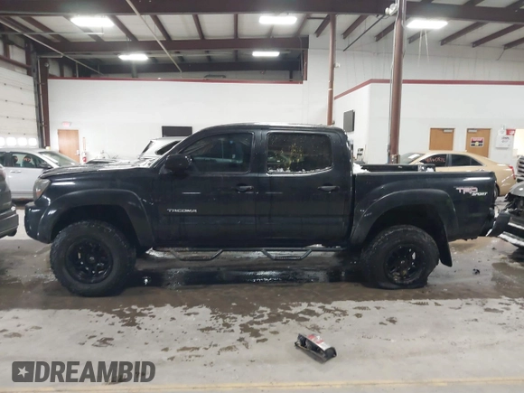 2009 Toyota Tacoma with VIN 3TMLU42N79M027885, listed as a IAAI auction lot 41146330 with 261,832 mi miles and . Bid and sale history available at DreamBid. Image 14.