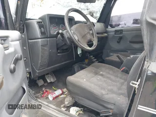 2003 Jeep Wrangler X with VIN 1J4FA39S33P375741, listed as a IAAI auction lot 40858427 with Not provided miles and . Bid and sale history available at DreamBid. Image 5.