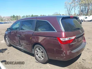 2011 Honda Odyssey EX-L with VIN 5FNRL5H69BB093996, listed as a IAAI auction lot 42151381 with 88,531 mi miles and . Bid and sale history available at carsss.com. Image 14.