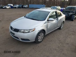 2011 Kia Forte LX with VIN KNAFT4A24B5403622, listed as a IAAI auction lot 41774093 with 143,971 mi miles. Bid and sale history available at carsss.com. Image 2.