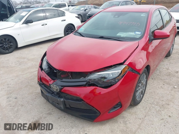 2019 Toyota Corolla L with VIN 5YFBURHEXKP882871, listed as a IAAI auction lot 41747710 with 104,117 mi miles. Bid and sale history available at carsss.com. Image 6.