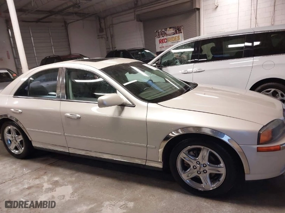 2002 Lincoln LS w/Base Pkg with VIN 1LNHM87AX2Y620293, listed as a IAAI auction lot 41461349 with 129,295 mi miles. Bid and sale history available at carsss.com. Image 13.